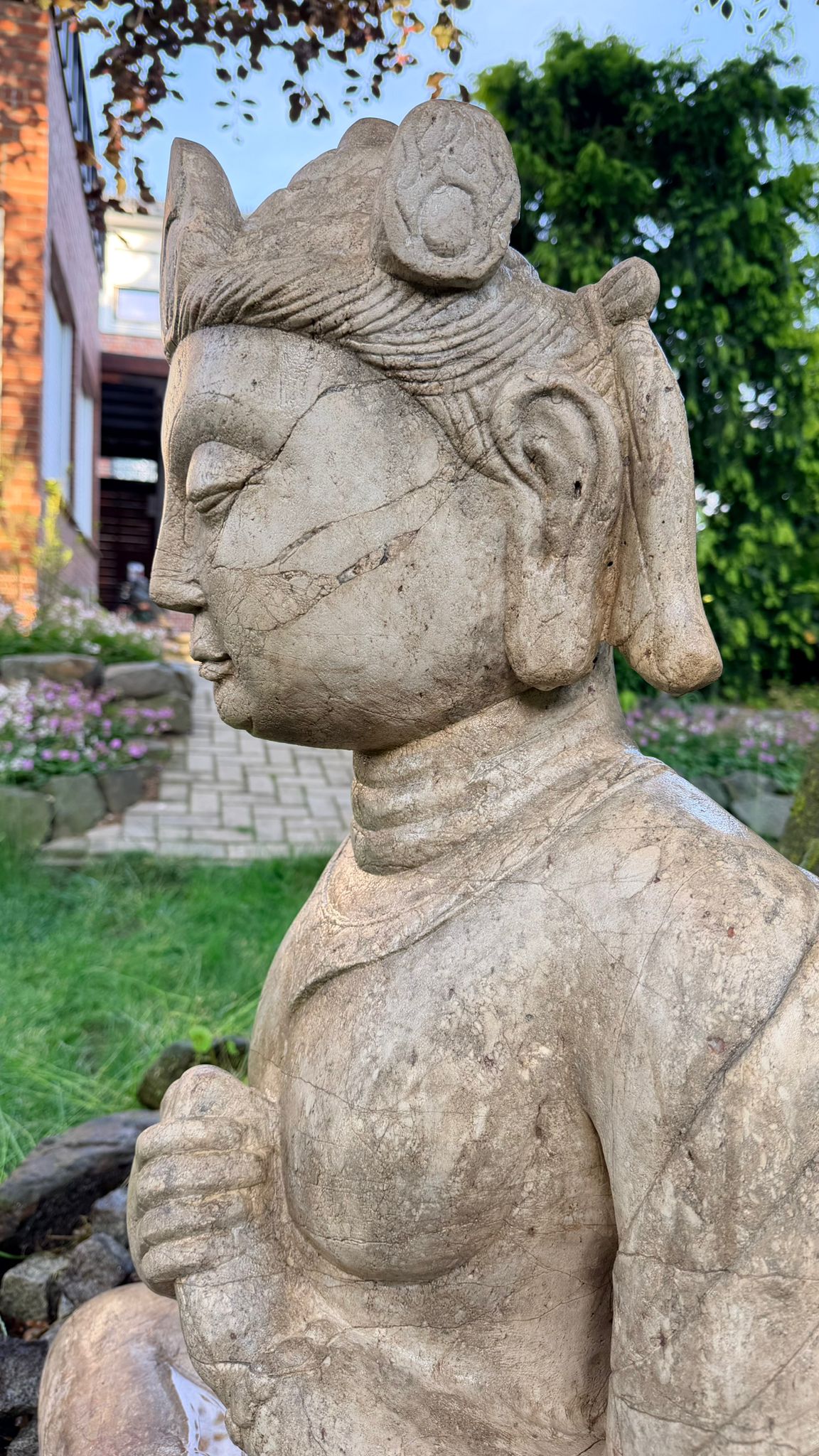 Authentic Javanese temple statue in natural stone with impressive dimensions