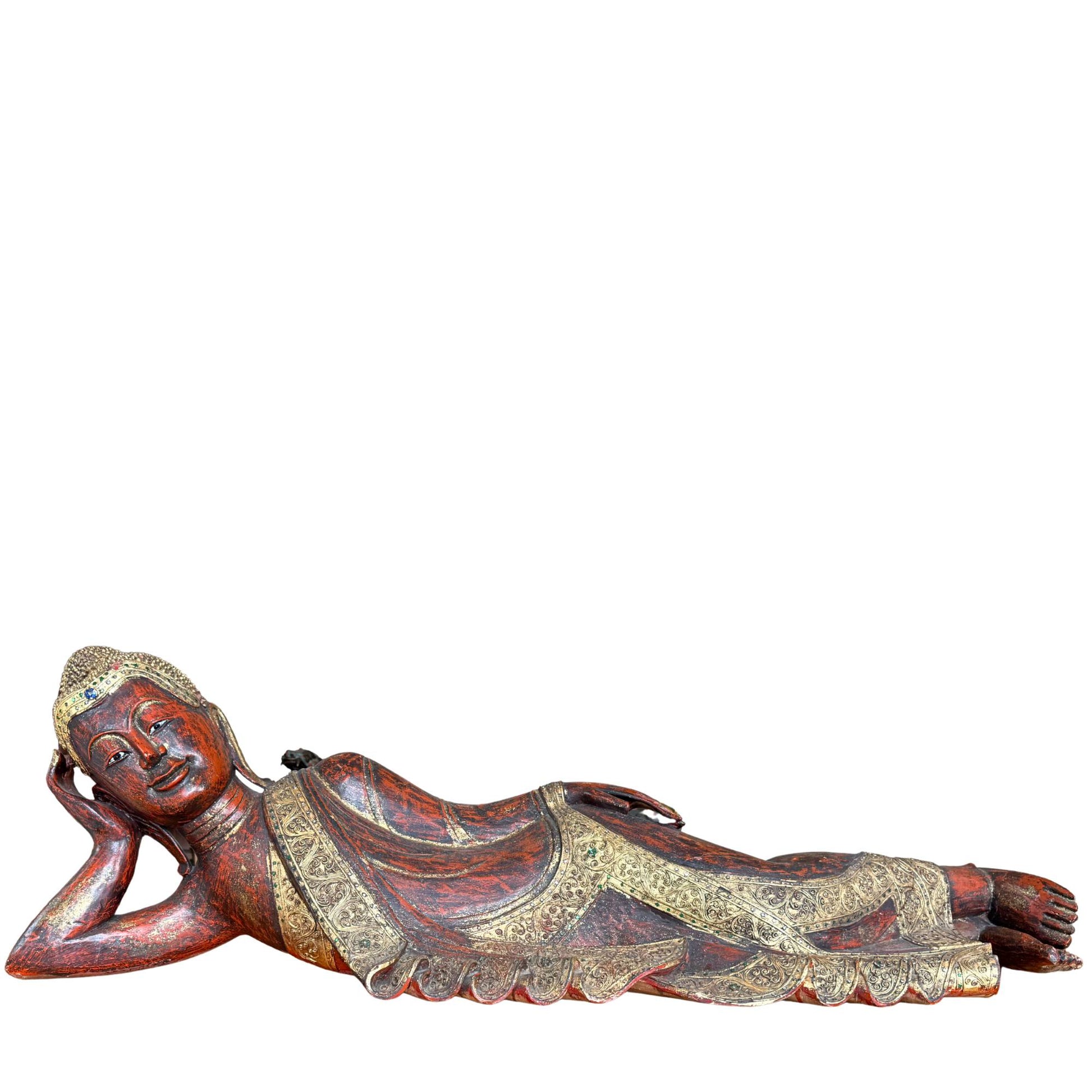 Monumental hand-carved wooden statue of a reclining Burmese Buddha, 160 cm long