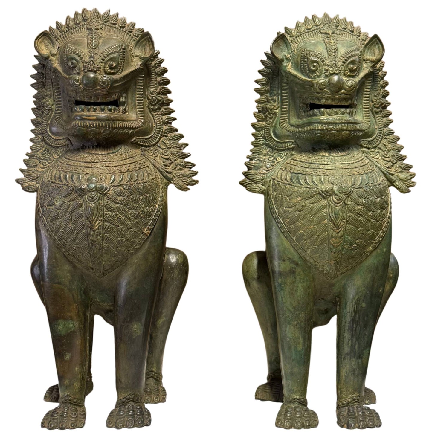 Pair of monumental Singha temple lions of very old bronze for house protection