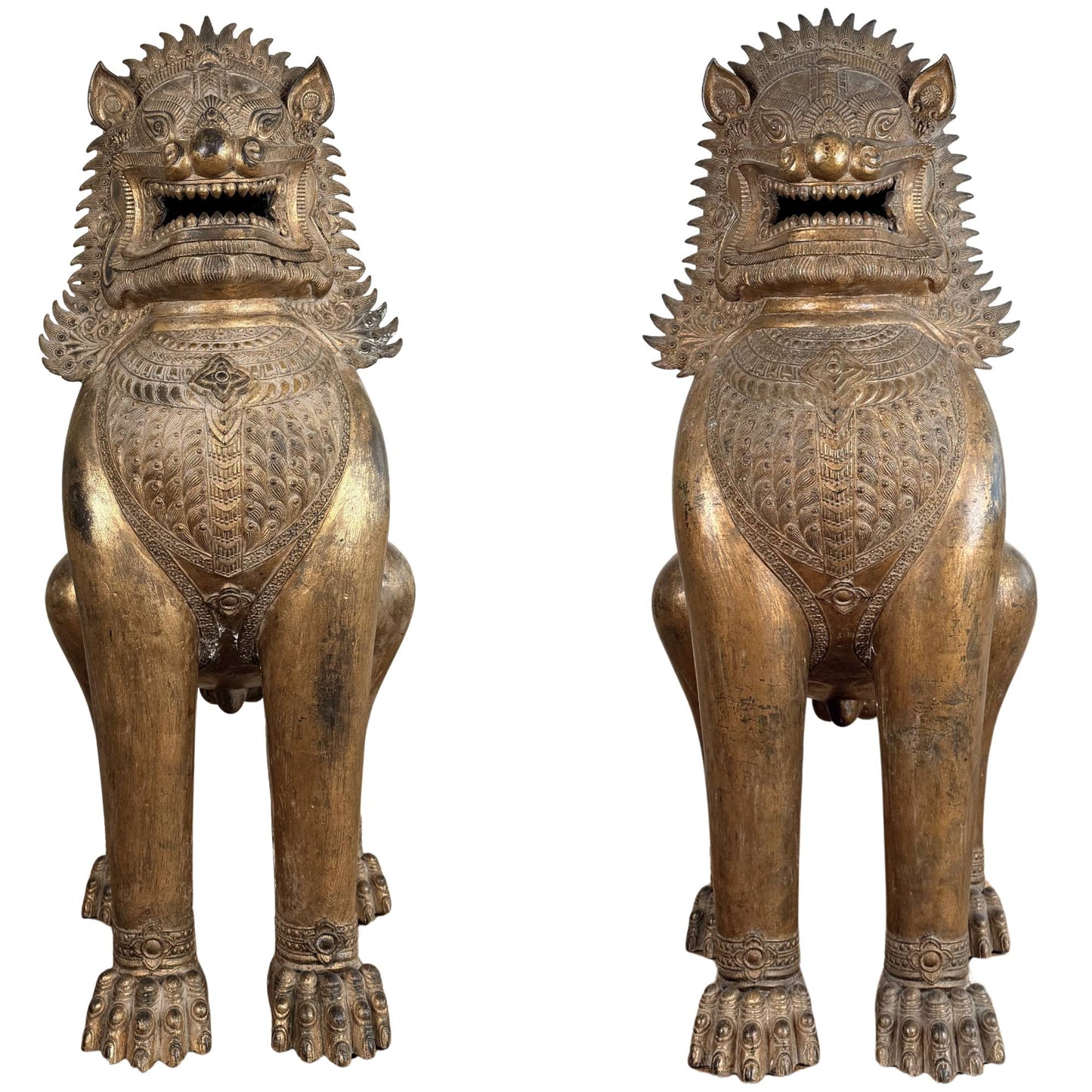 Monumental gilded Singha temple lion from Thailand, antique Buddhist temple guardian with a powerful ritual presence