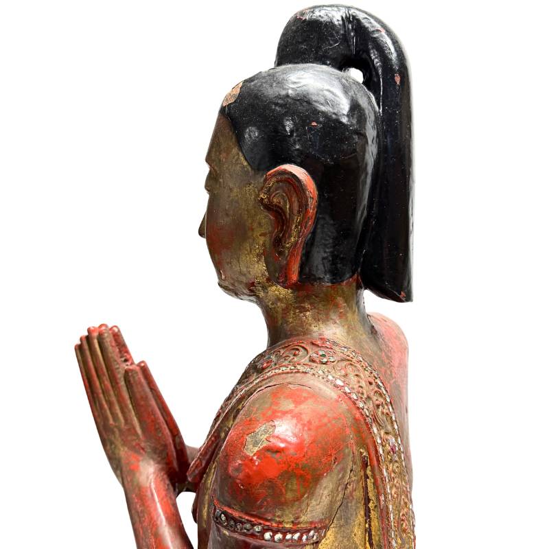 Myanmar temple statue in wood with gilded surface
