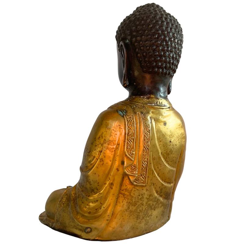 Nepal bronze Buddha with stupa in hand and patina in meditation posture
