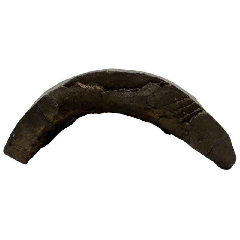 Traditional wooden mask from Nepal with an elongated shape
