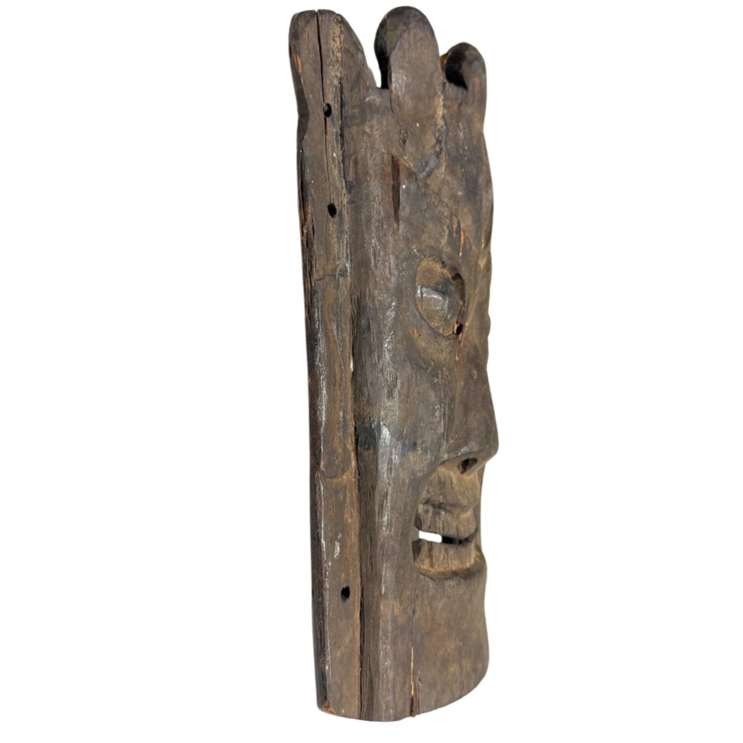Nepalese ritual mask of wood, antique spiritual object with weathered surface and deep age patina