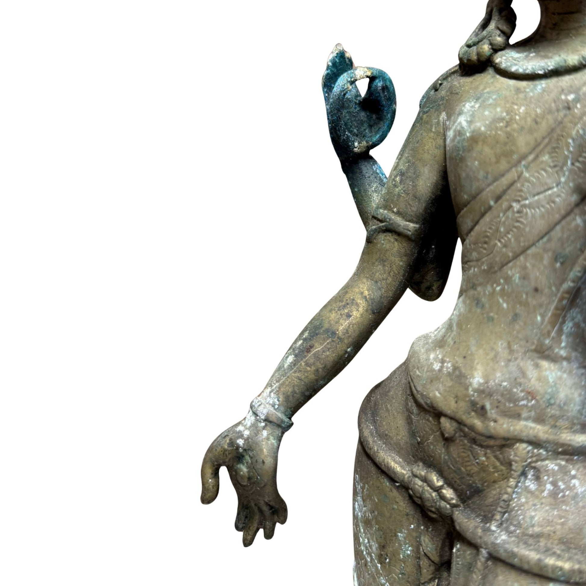 Detail of hand and mudra of Nepalese four-armed Avalokiteshvara in bronze, 17th century