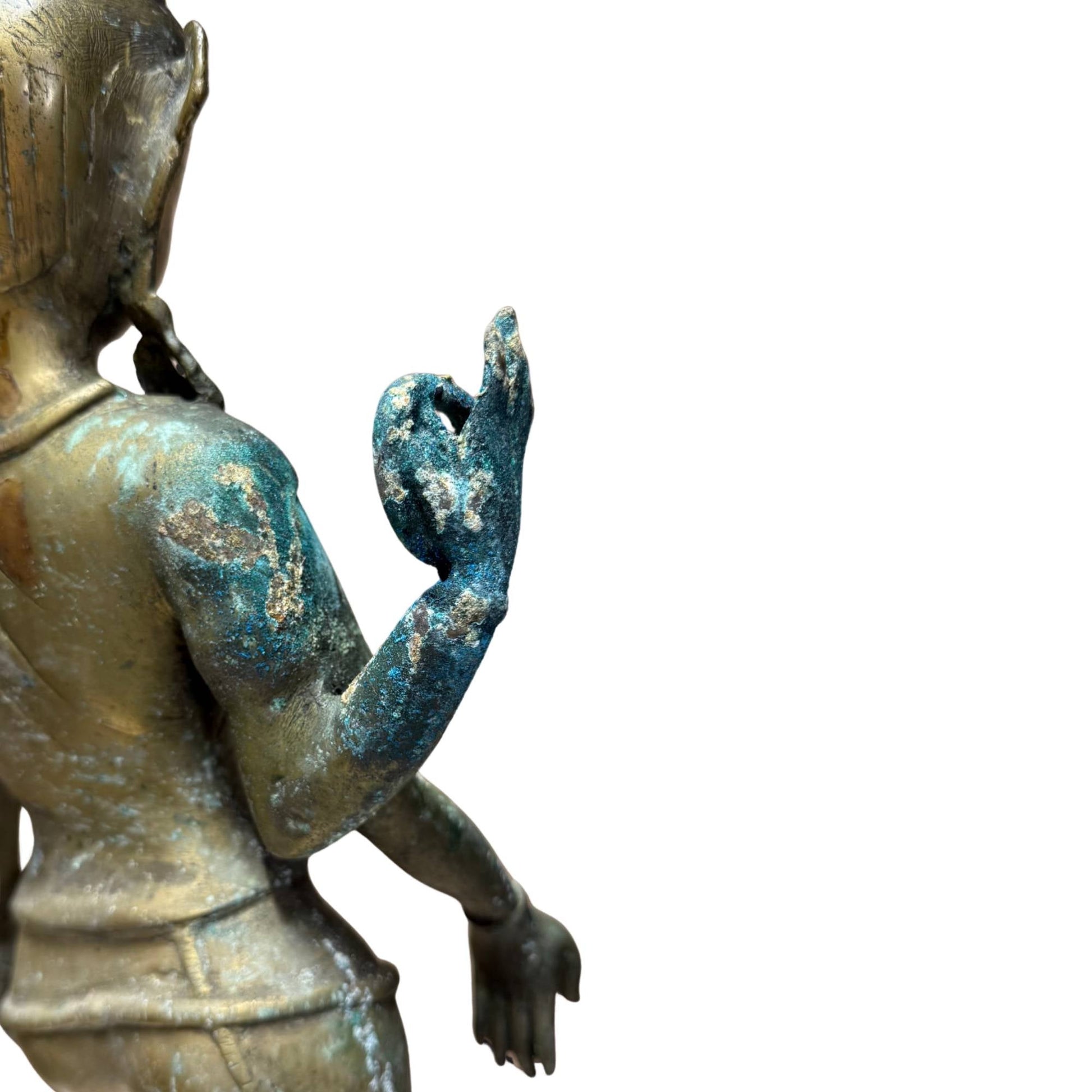 Detail of natural blue-green patina on the rear hand of Nepalese four-armed Avalokiteshvara, 17th century