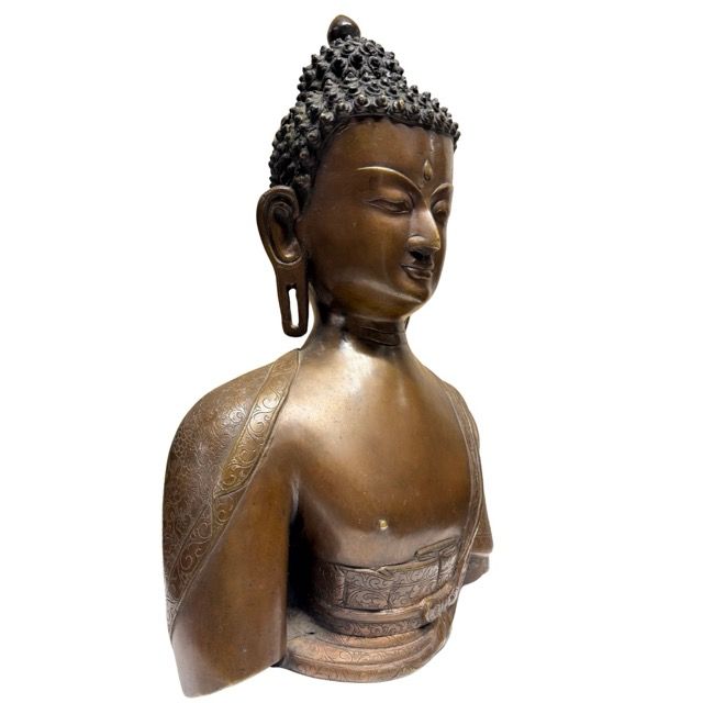 Nepalese bronze Buddha bust with natural patina