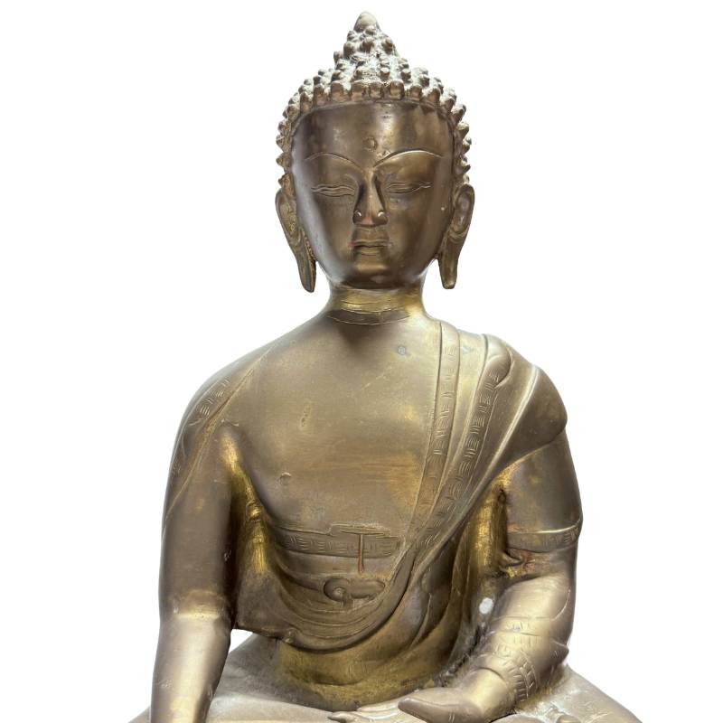 Himalayan Buddha in bhumisparsha mudra with gilded surface