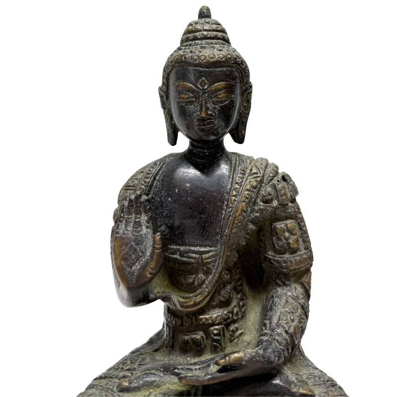 Nepalese Newar Buddha pair in ormolu bronze with deep patina