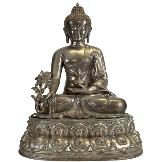 Antique Newar Bhaisajyaguru Medicine Buddha of silver-plated bronze on a double lotus throne, front view.