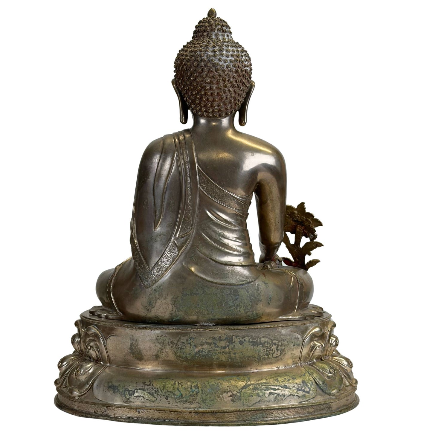 Back of an antique Newar Bhaisajyaguru in silver-plated bronze on a two-part lotus throne, with natural patina, wear, and a finely engraved monk's robe on the back.