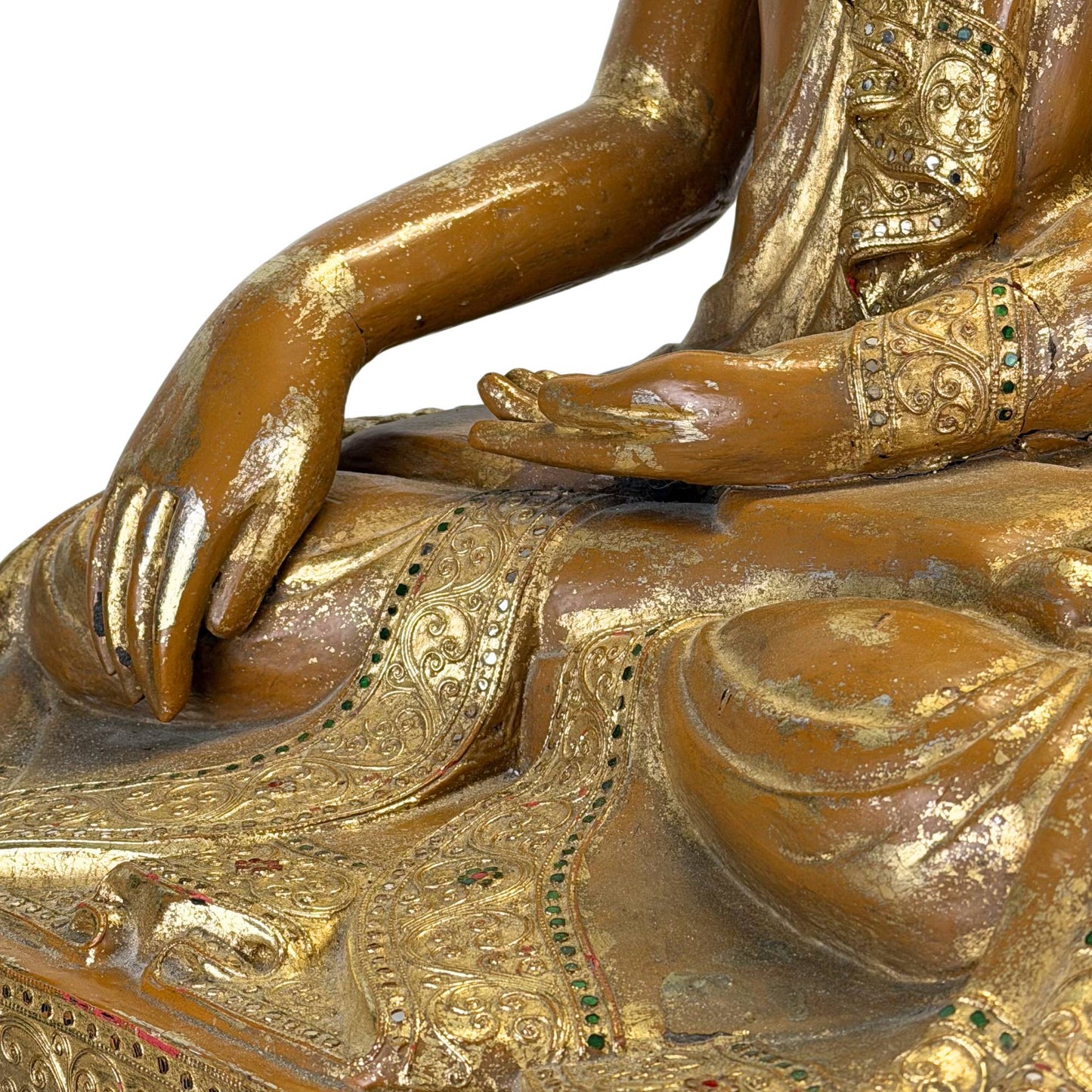 Antique Burmese Buddha on an old wooden base with visible drying cracks and authentic signs of use.