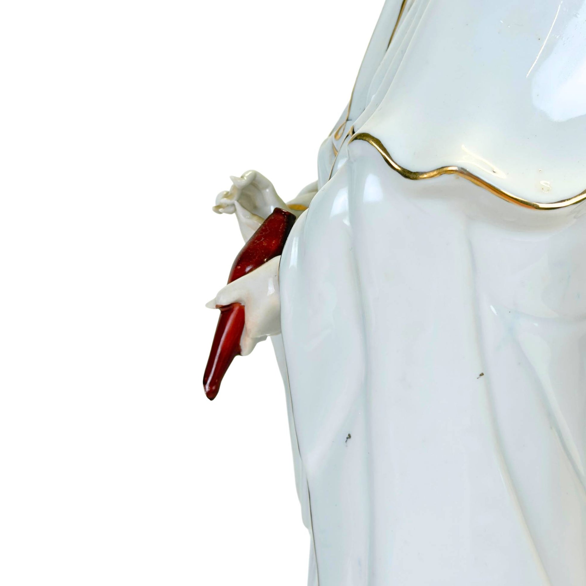 The underside of the 3 kg Guan Yin statue showing the raw porcelain.