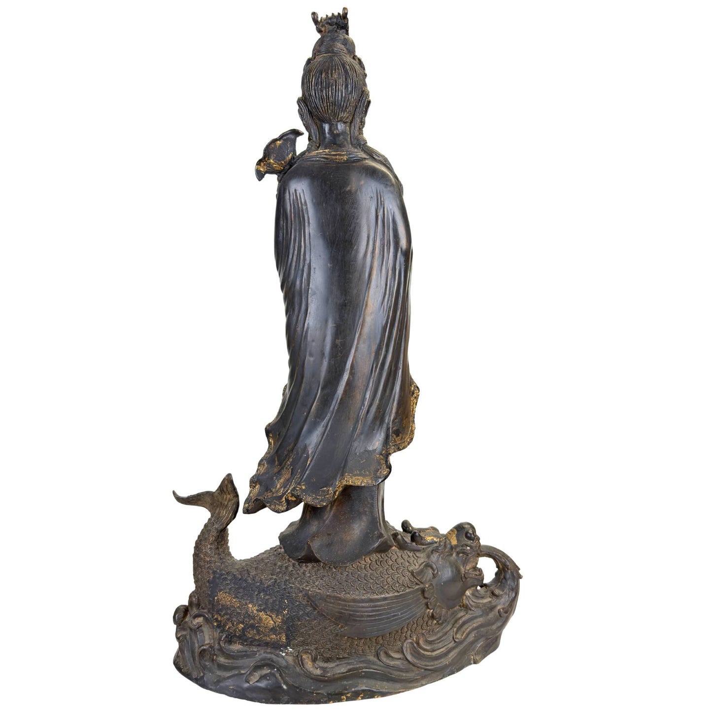 East Asian bronze temple statue of Guanyin on a mythical water dragon with an expressive base