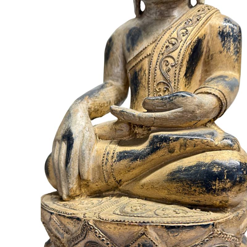 Surface with wear of gilding on a Buddha statue from Myanmar