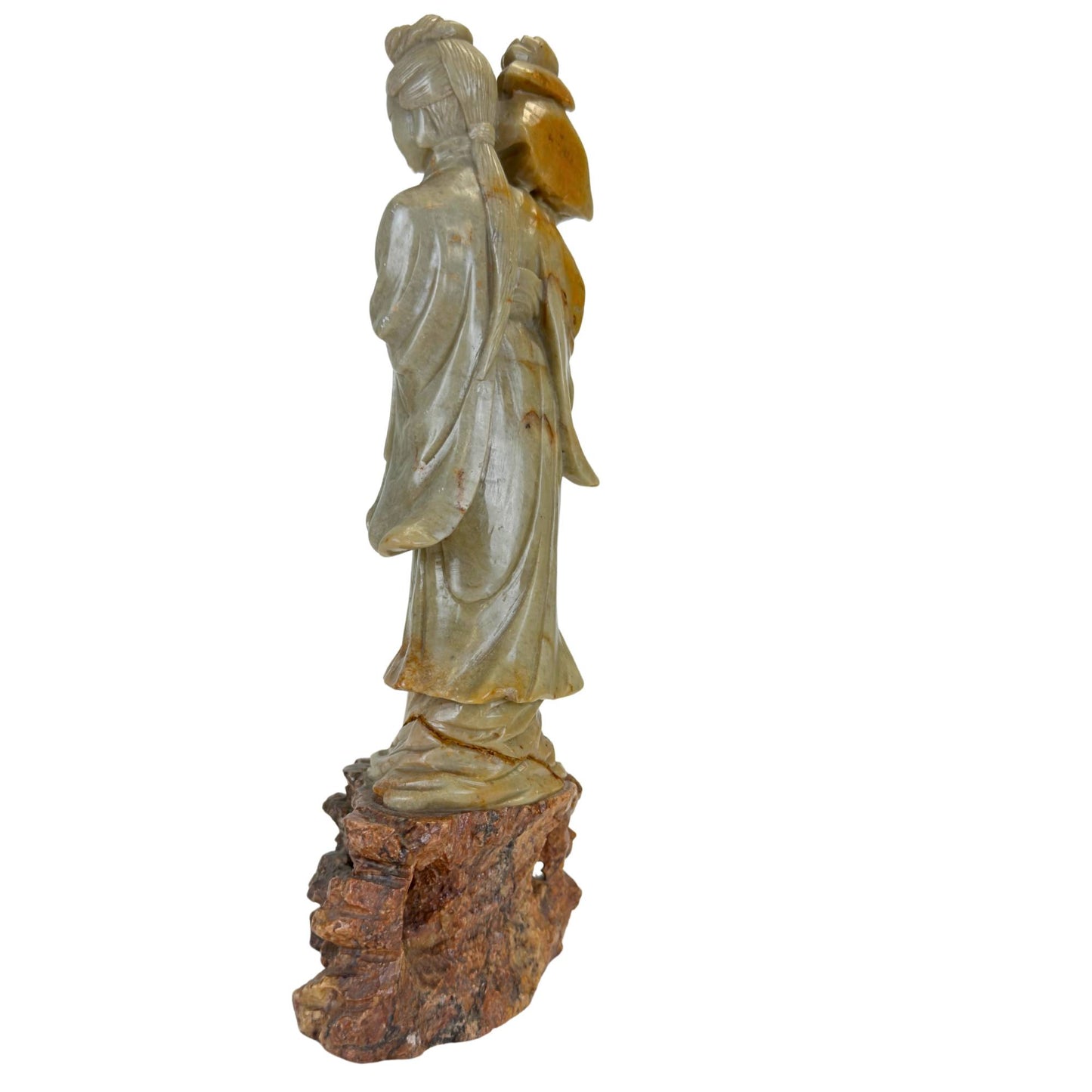 Oriental art object of the goddess He Xiangu in natural green and brown soapstone.