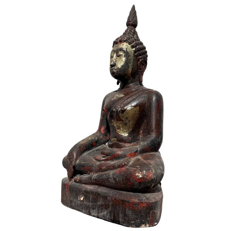 Original patina on an antique Burmese wood carving.