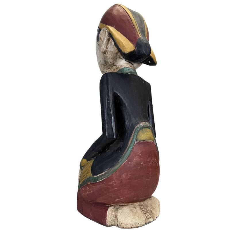 Original mineral polychromy on early 20th-century Javanese statues.