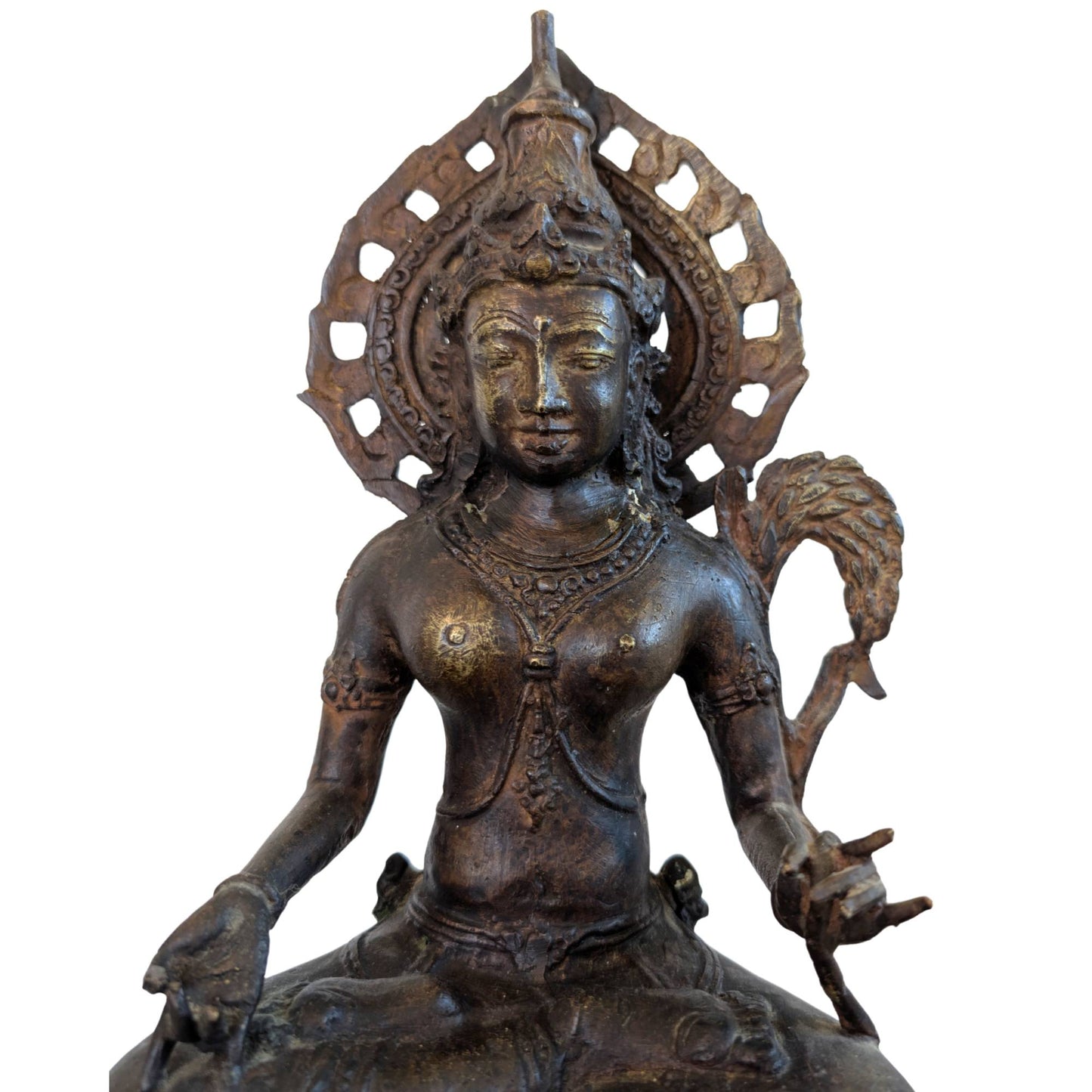 Old Asian bronze statue with authentic signs of wear