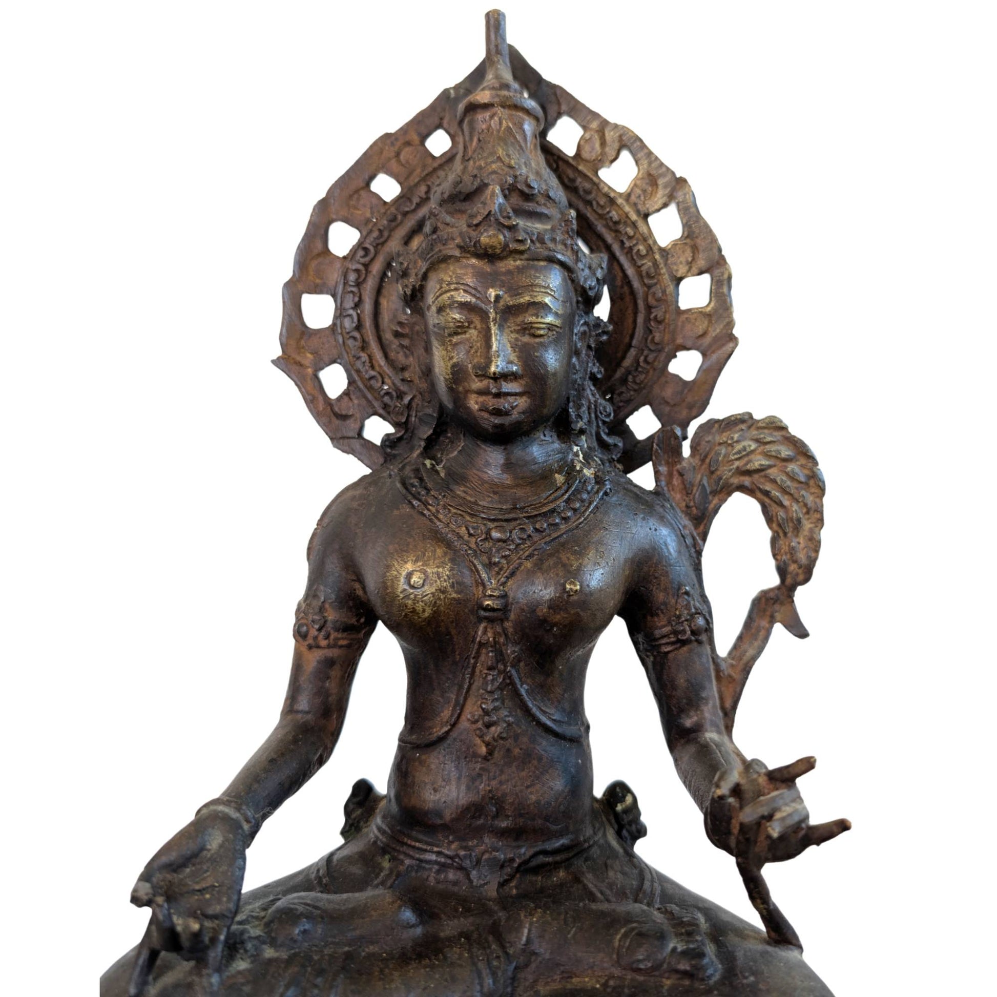 Old Asian bronze statue with authentic signs of wear
