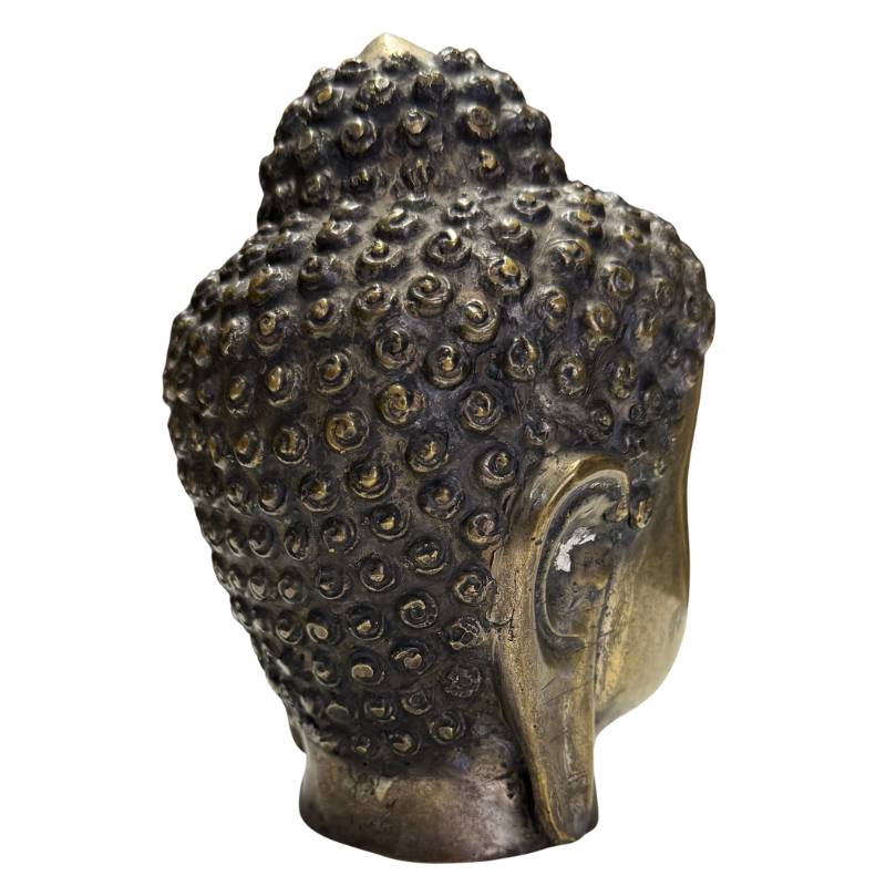 Old bronze Buddha head with remnants of mercury gilding
