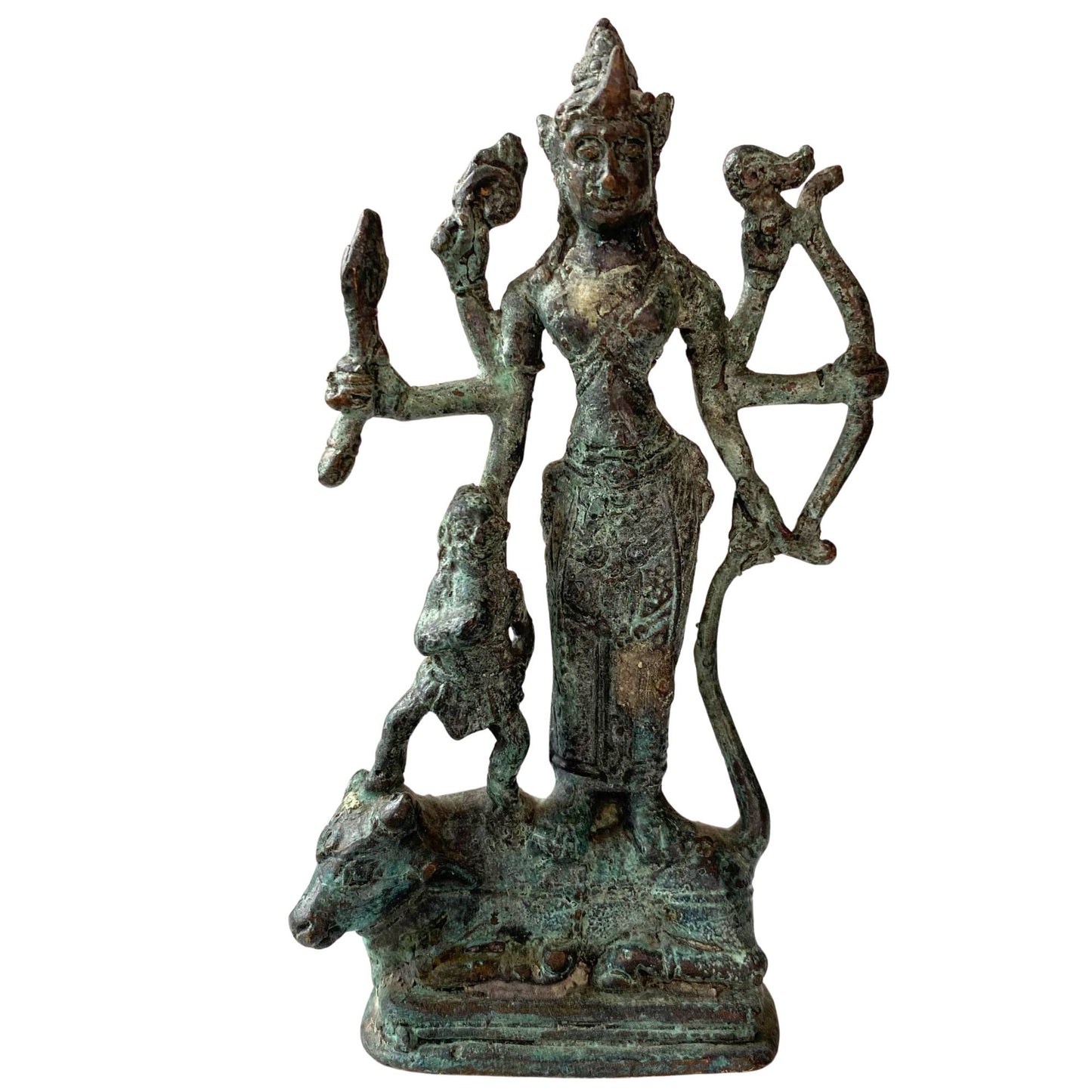 Front view of an old bronze Durga statue in archaic Majapahit style.