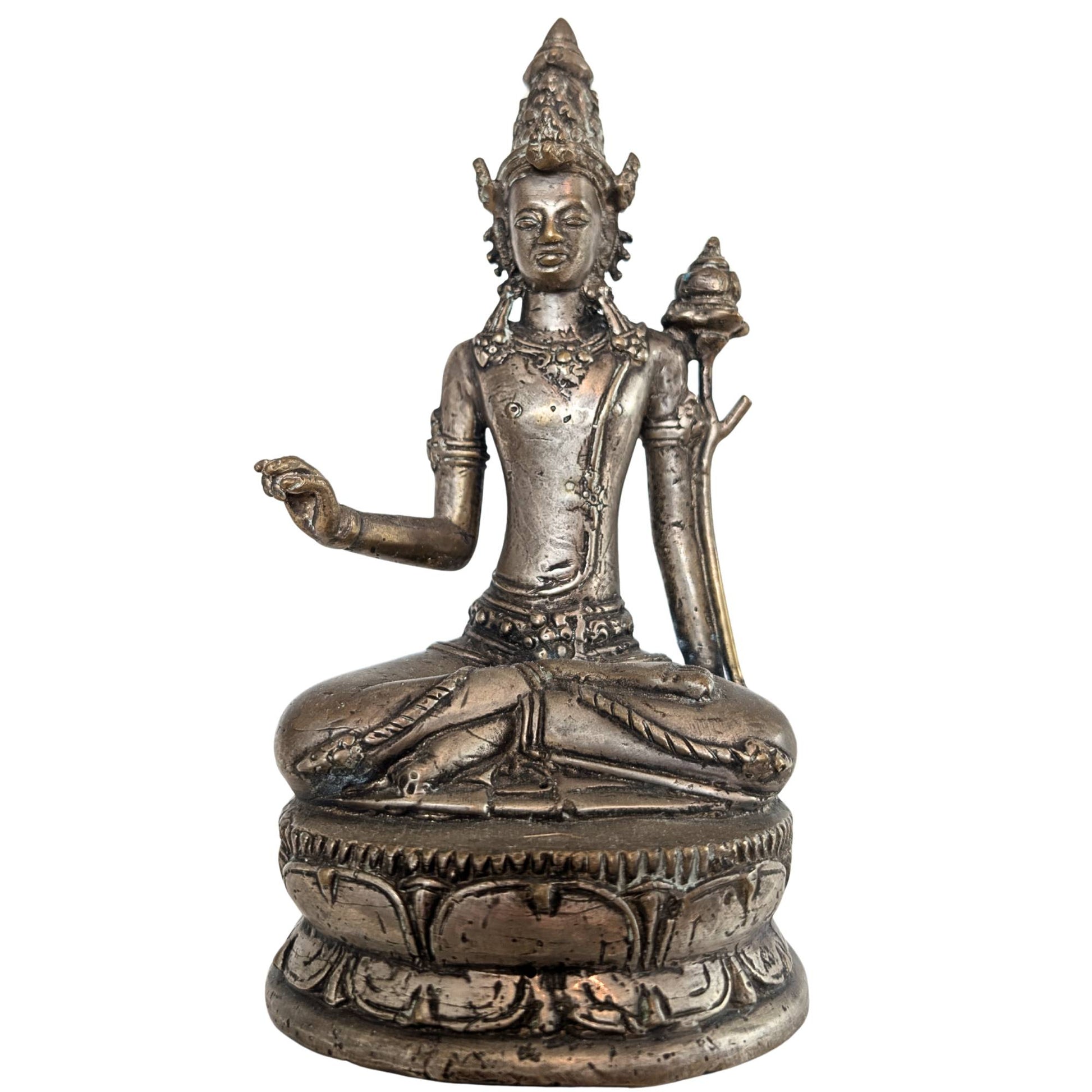Front view of the Javanese bronze statue Padmapani on a double lotus throne.