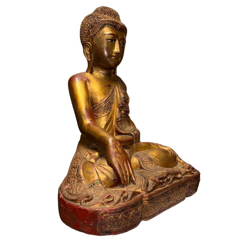 Large gilded wooden Buddha statue from Myanmar in Mandalay style with a serene appearance