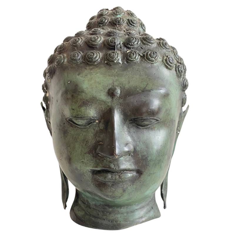 Old Thai Buddha head made of bronze