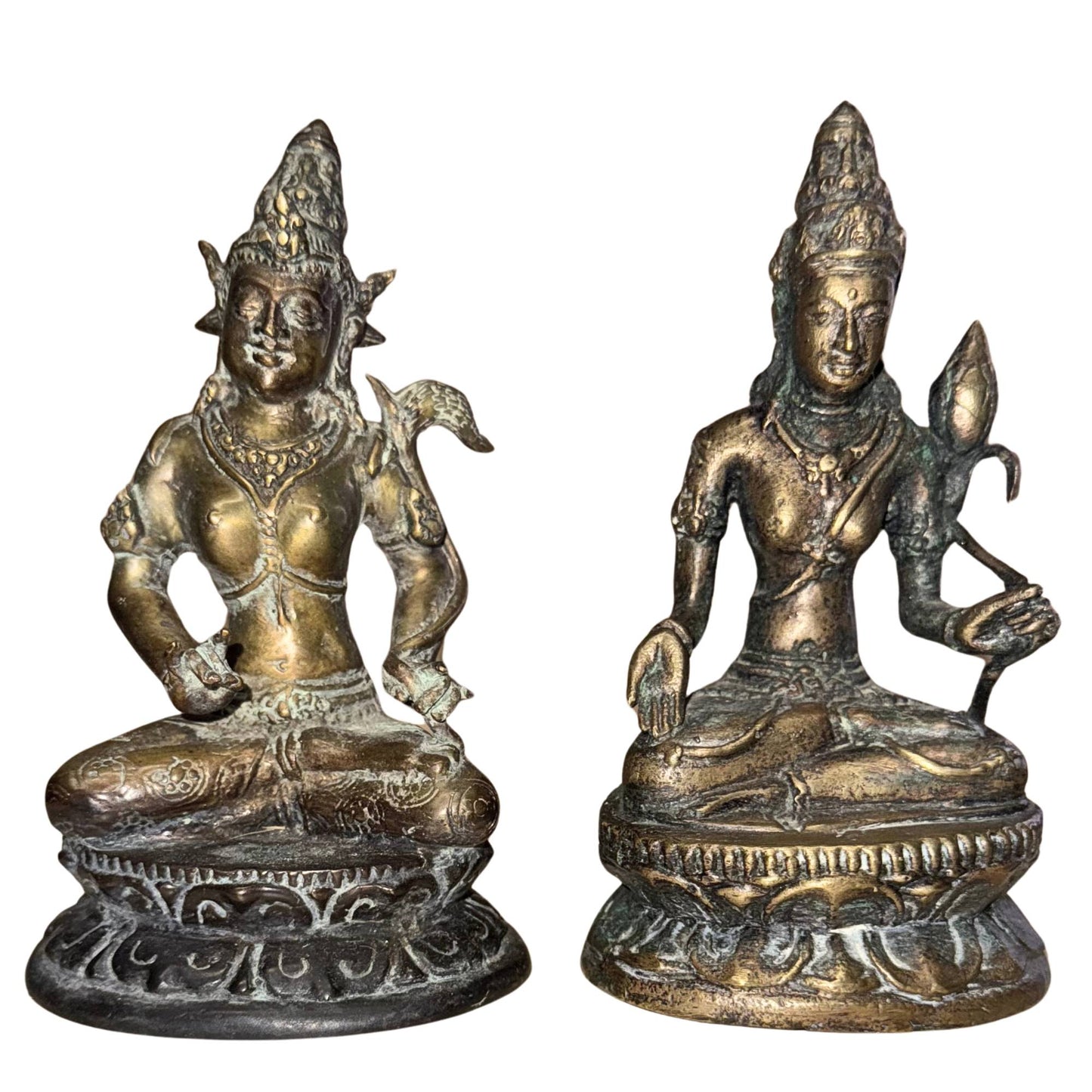 Old bronze Avalokiteshvara from the Himalayan tradition with green patina and gilded wear, a pair