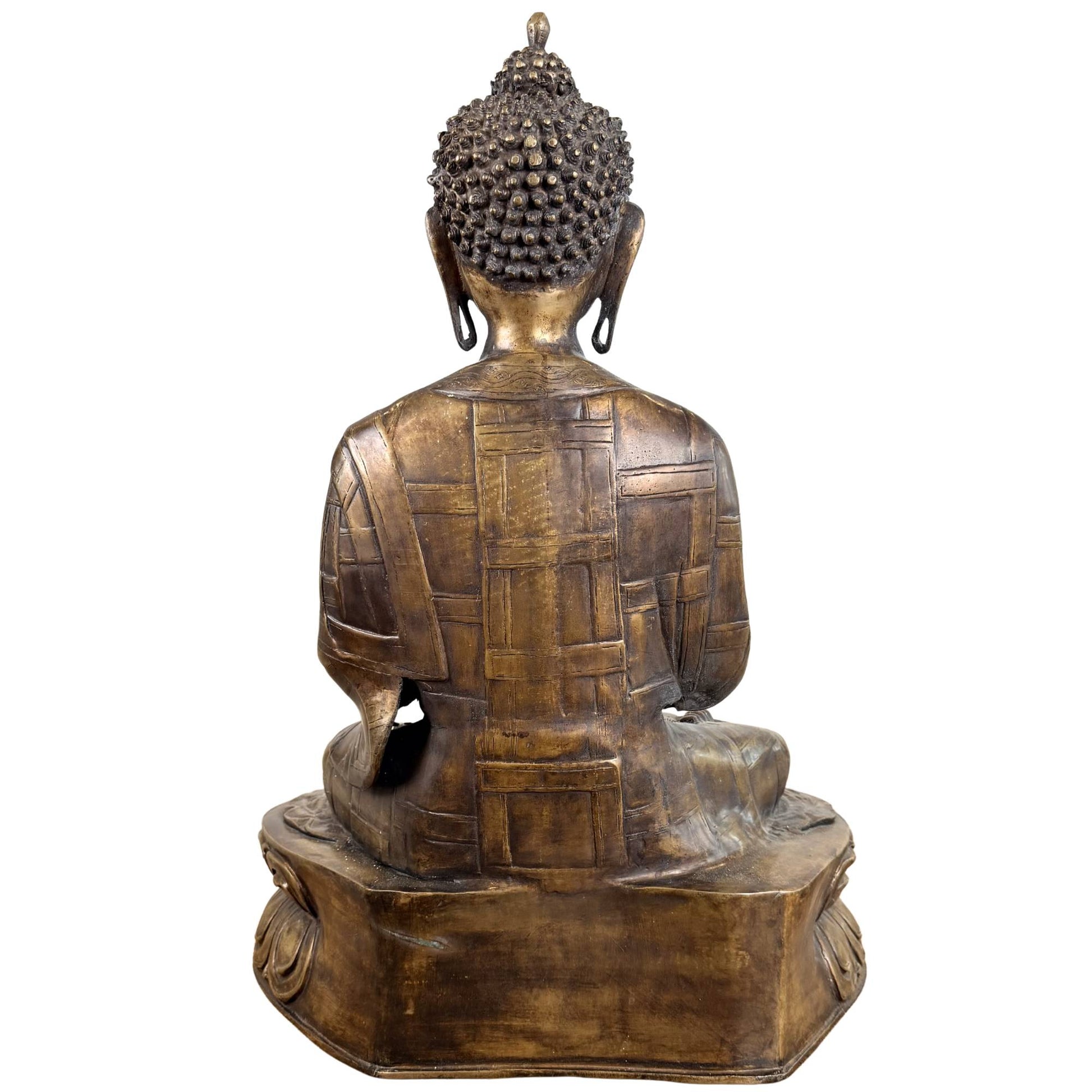 Old bronze Buddha with hand mudra and visible remnants of fire gilding