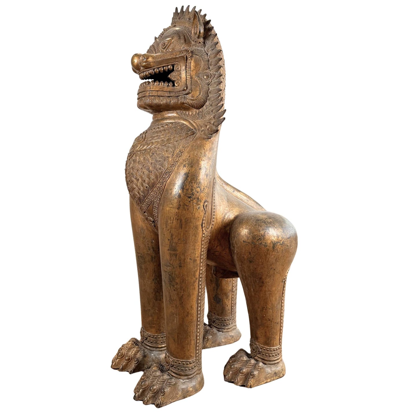 Ancient Thai lion temple protector, gilded Singha with ritual power and impressive ceremonial form