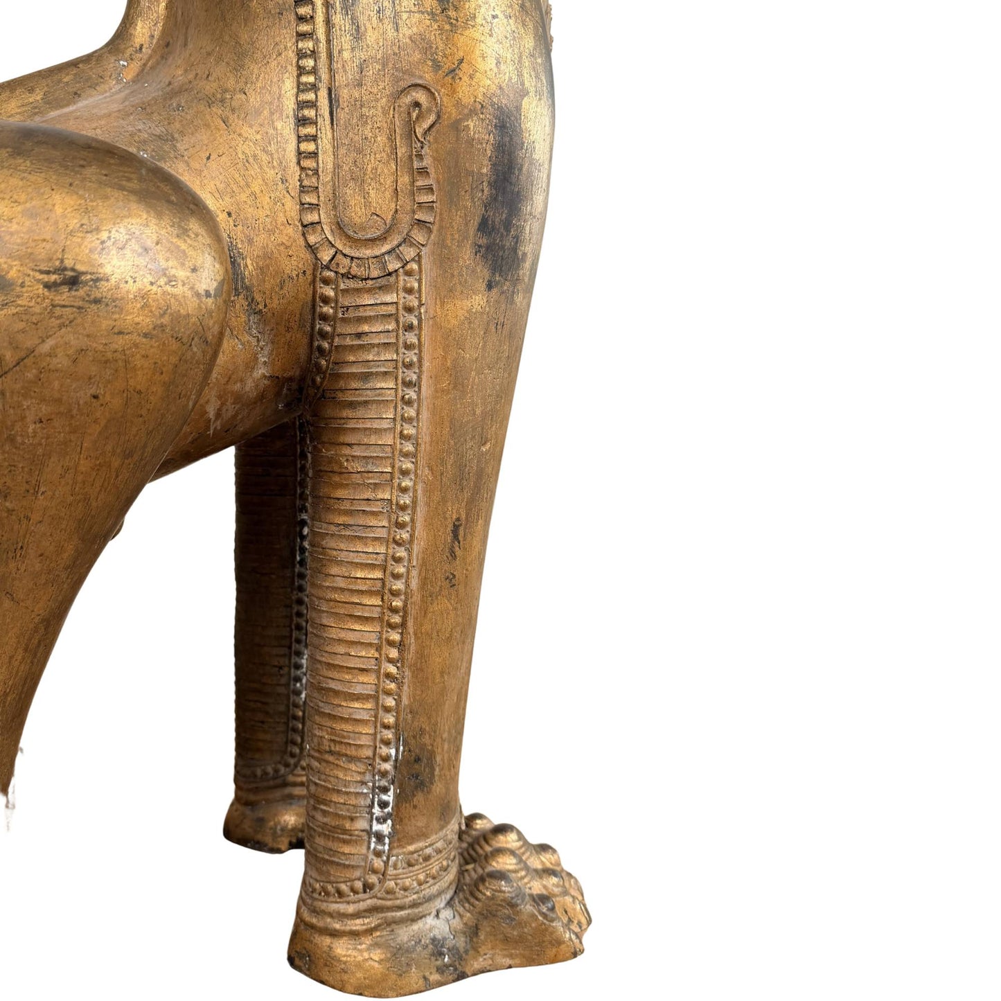 Old gilded temple lion from Siam, antique Singha with protective symbolism and strong temple presence