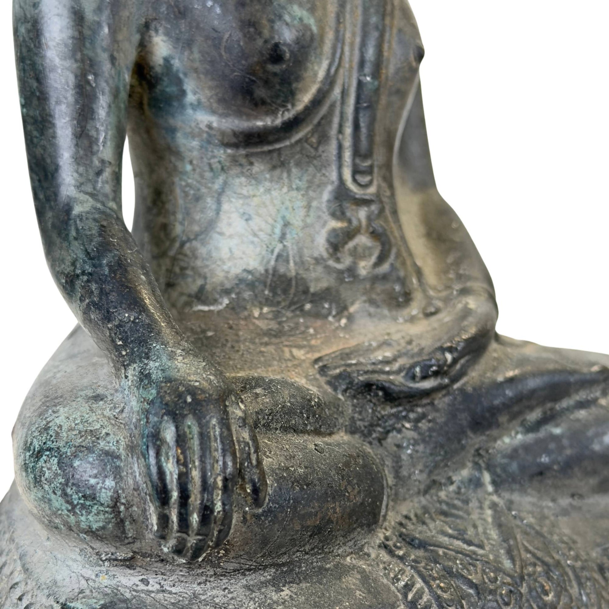 Visible signs of age and oxidation on the authentic bronze surface.