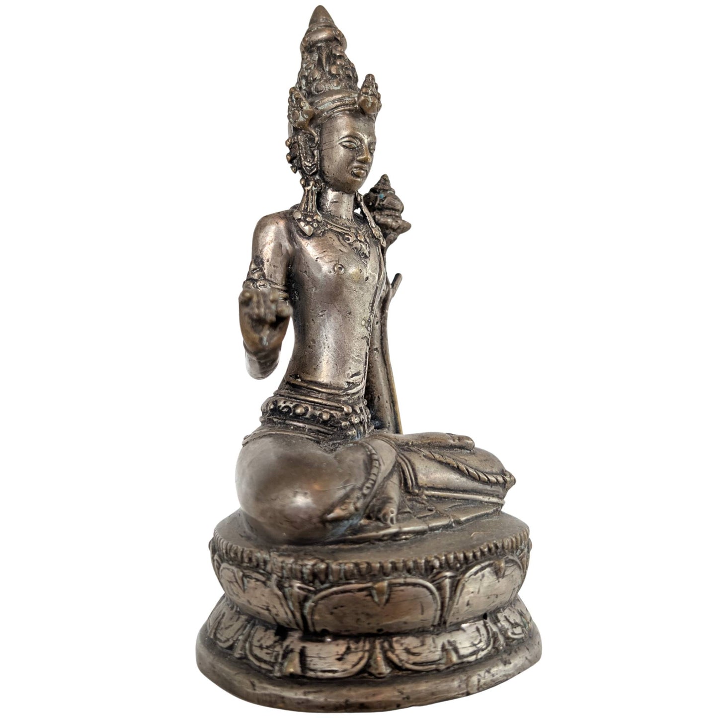 A three-quarter view shows the silvery gunmetal sheen of the Padmapani sculpture.