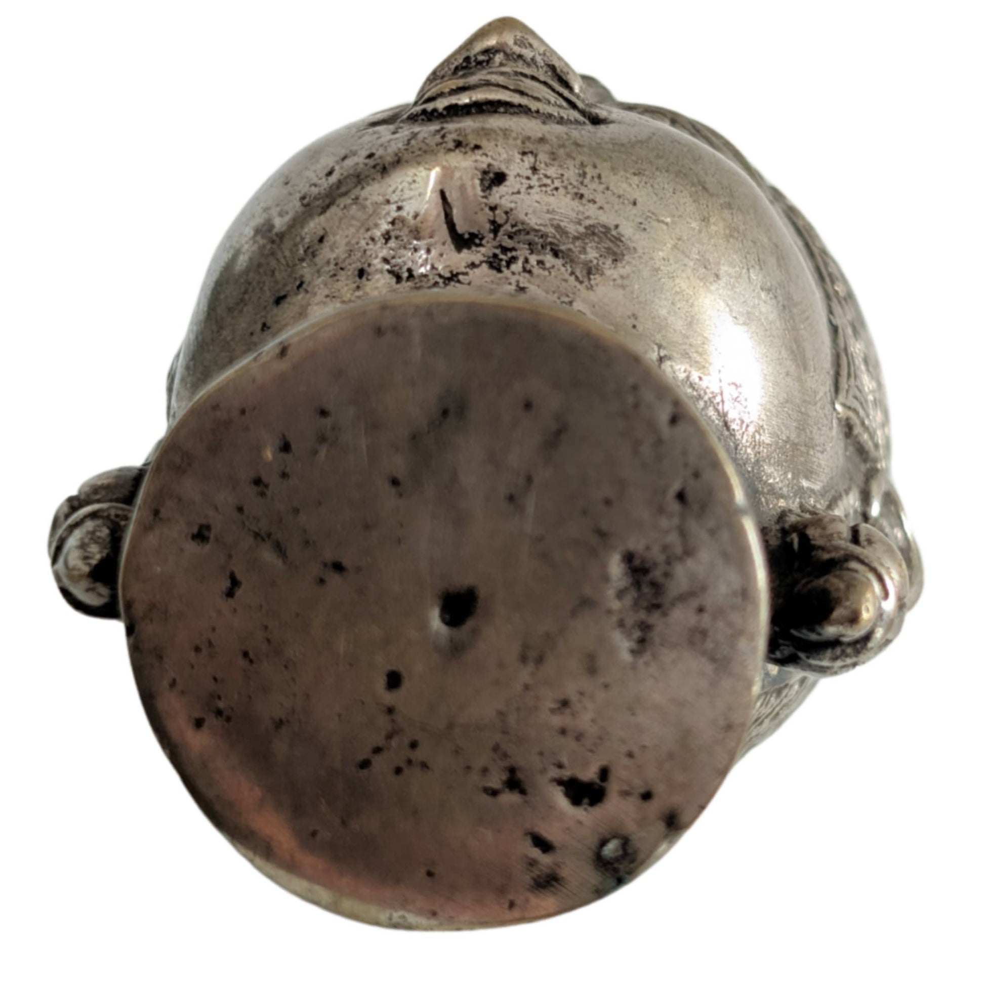 Side profile showing the classic Ayutthaya proportions of the head.