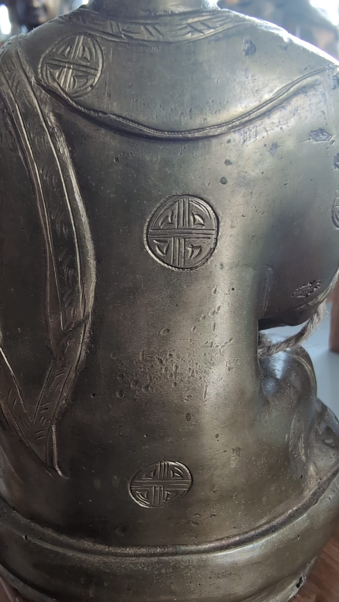 Chinese bronze Buddha statue from the Qing period with longevity motifs