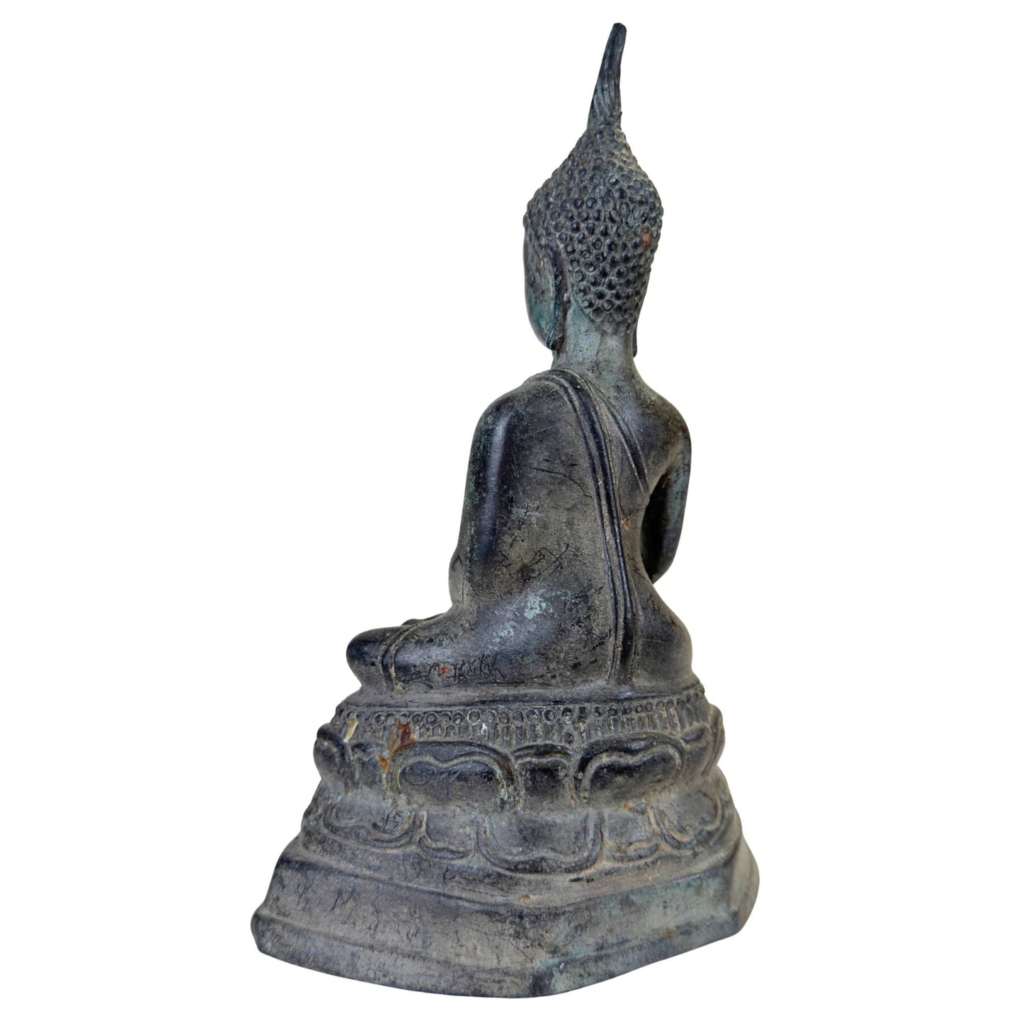 Detail of the richly carved and decorated throne of the seated Buddha.