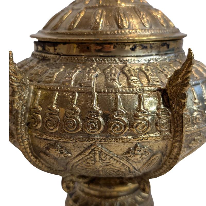 Traditional Buddhist bronze ritual bowl with symbolic decoration