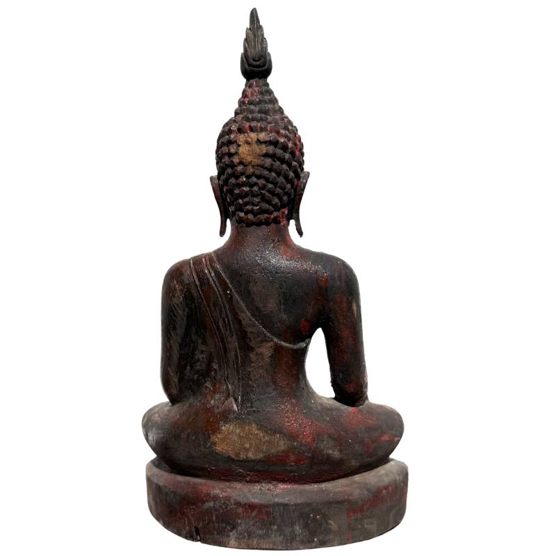Ritually consecrated Buddha with a deep shaft at the base.