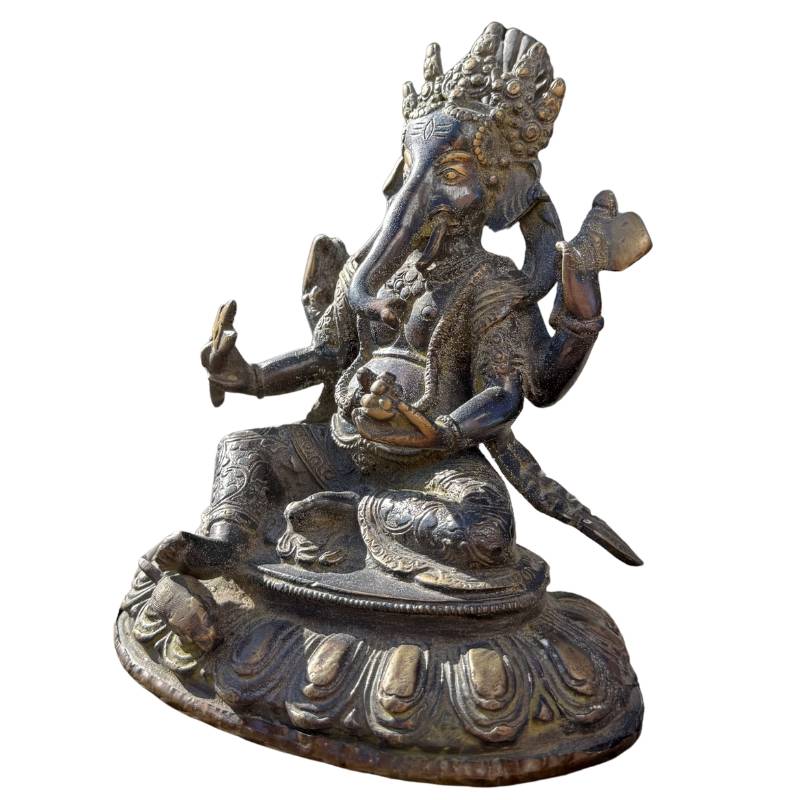 bronze-20cm Angled front view of the bronze Ganesha statue, showing the spatial depth and the rich texture of the metal.