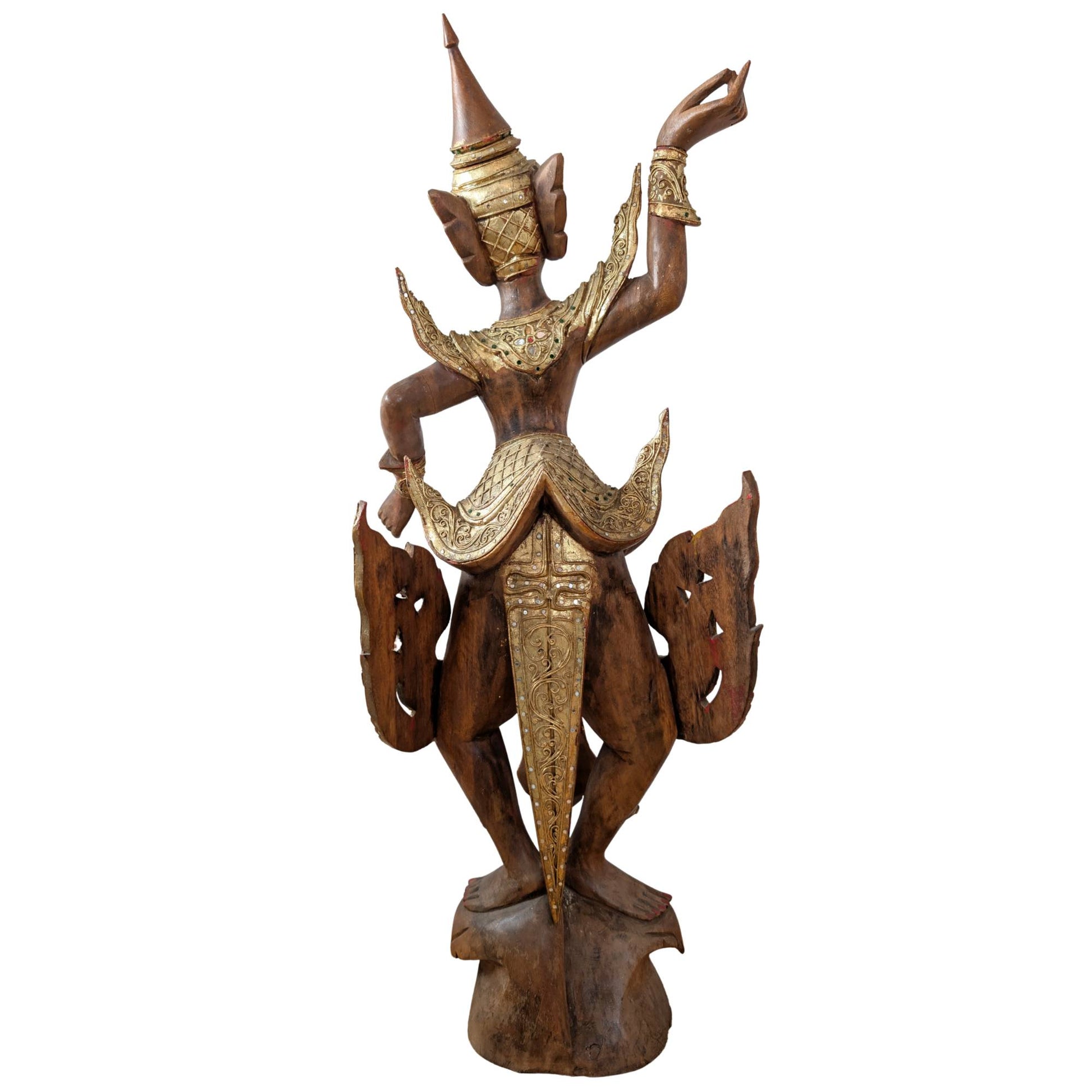 Close-up of the serene face of the wooden Burmese Kinnara.