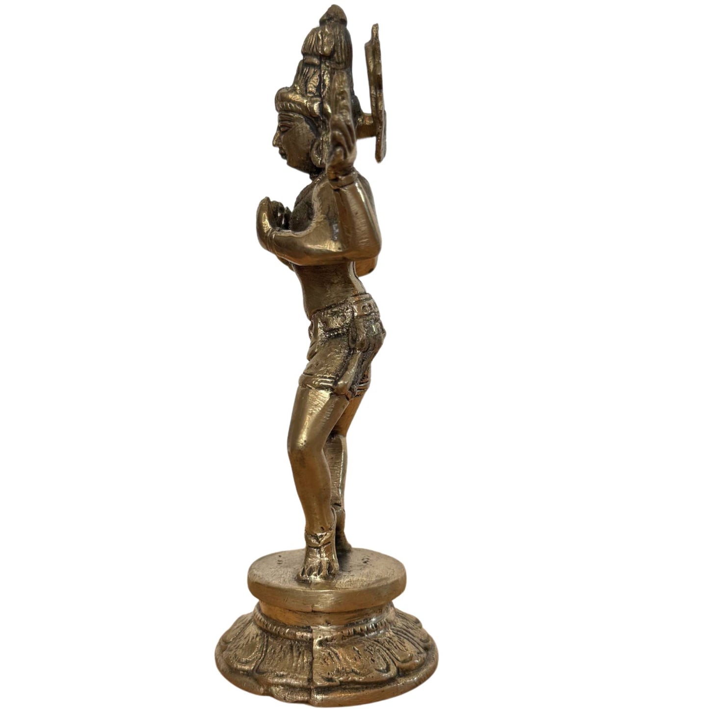 Sleek side profile of the dancer on the lotus base.