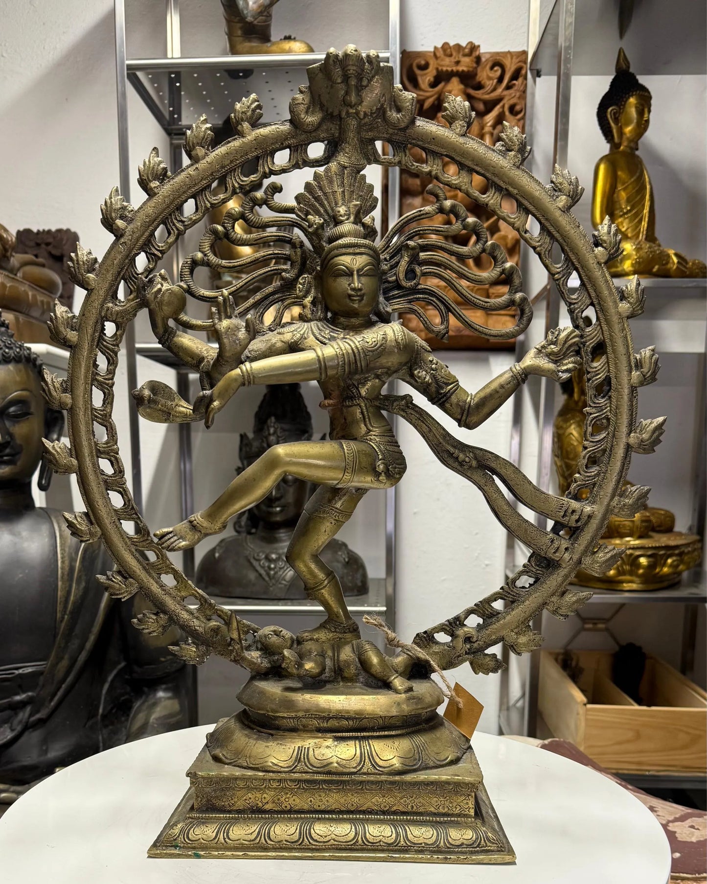 Shiva Nataraja bronze statue India cosmic dance on Apasmara demon