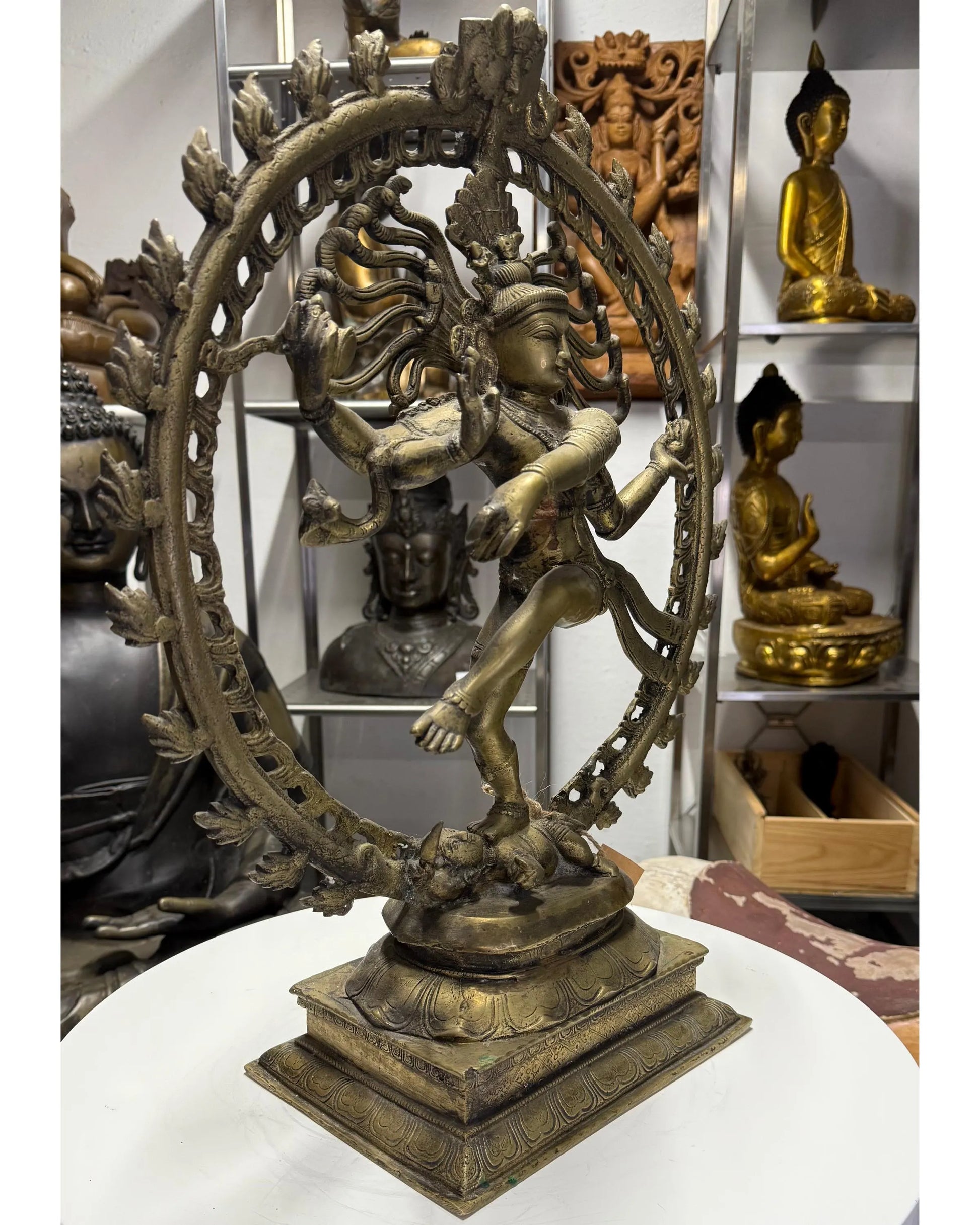 Shiva Nataraja bronze temple statue India with circle of flames symbolism