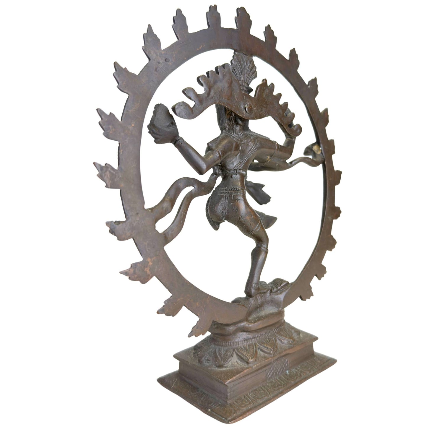 Shiva Nataraja sculpture with decorated lotus base and geometric relief on the pedestal