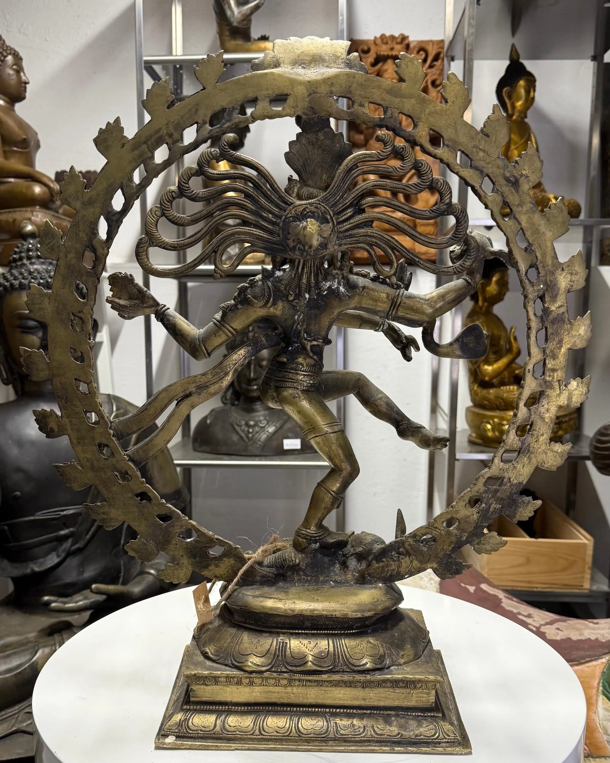 Shiva Nataraja foot on Apasmara demon bronze statue India