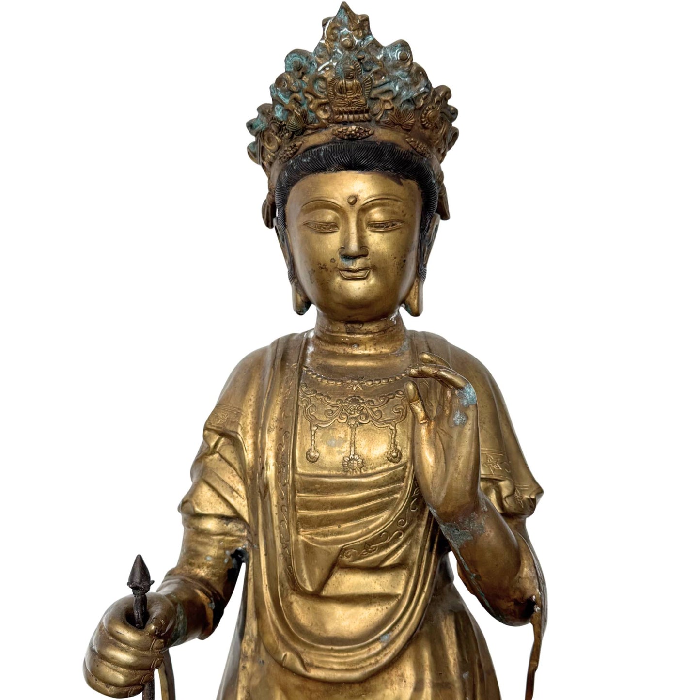 Close-up of the face and upper body, showing the male facial features of the Sho-Kannon and the layered patina of the remaining fire gilding.