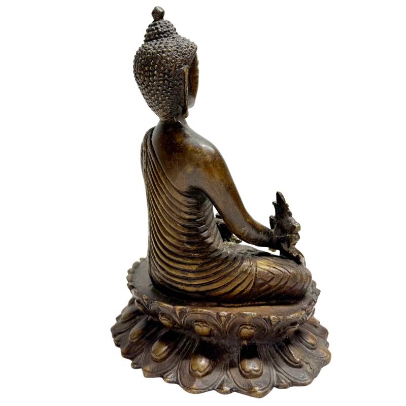 Sino Tibetan bronze Buddha statue with serene expression
