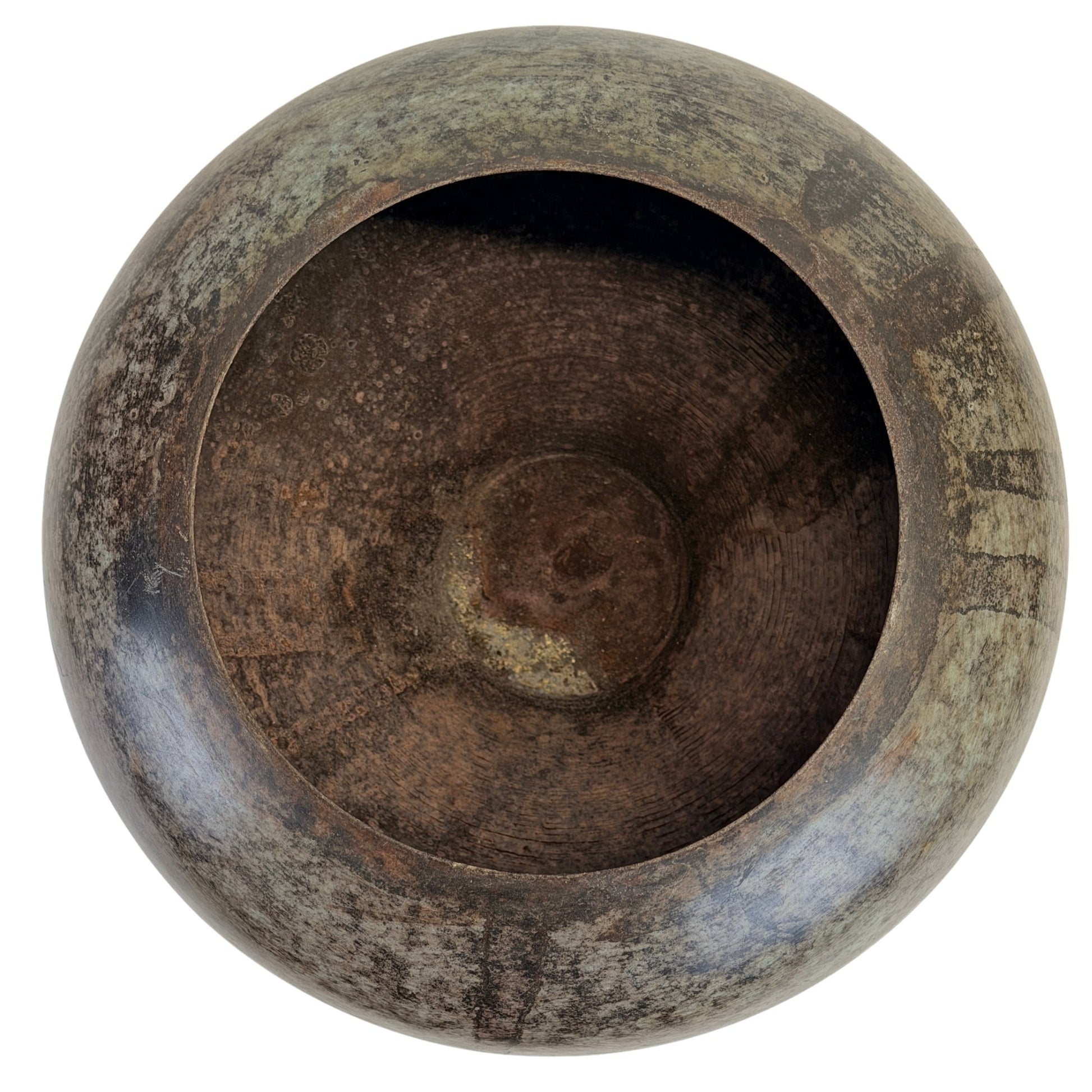 Interior of Indian bronze vessel B with hand-working marks and patina